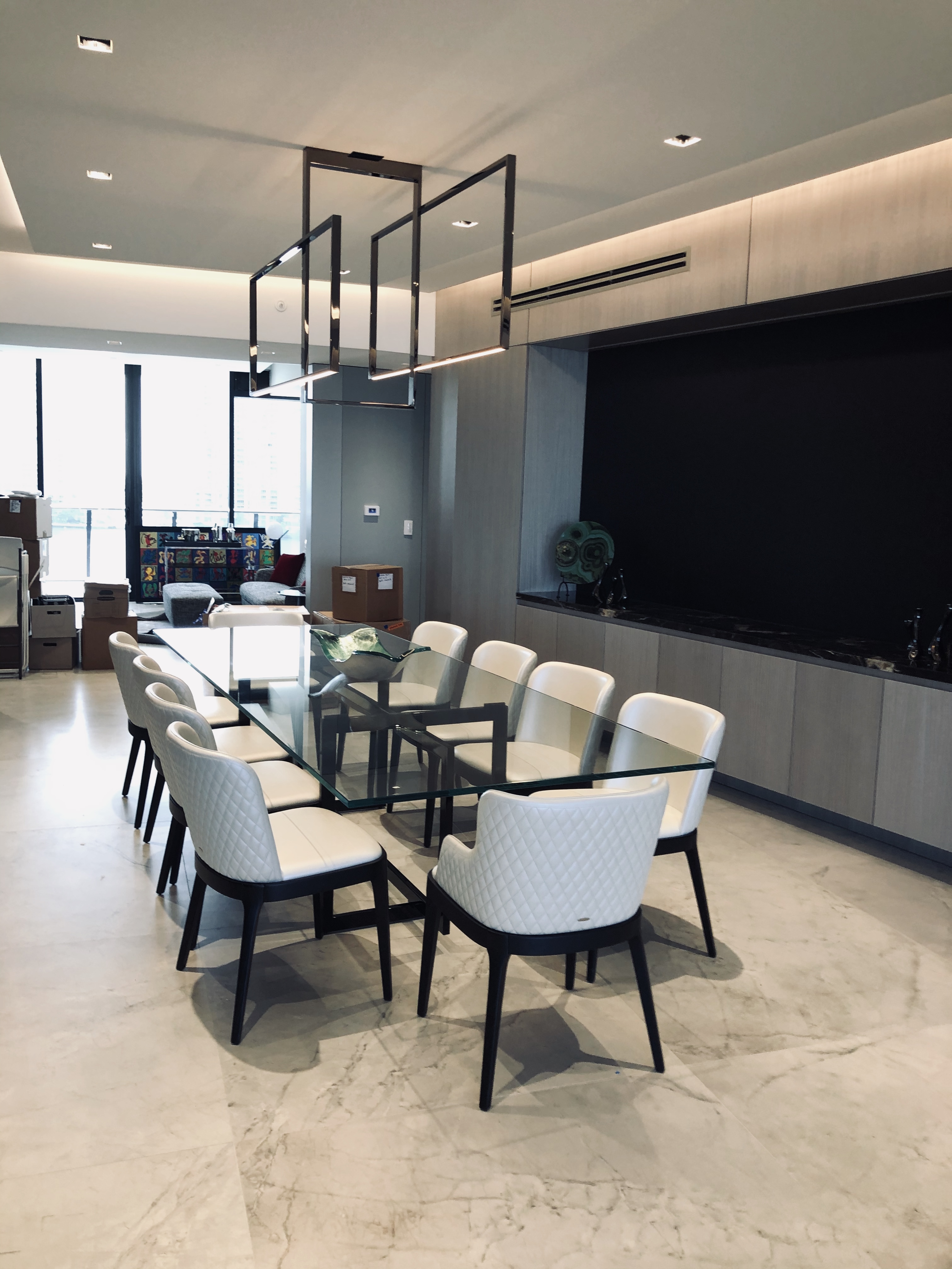 Modern kitchen with waterfall island and pendant lighting