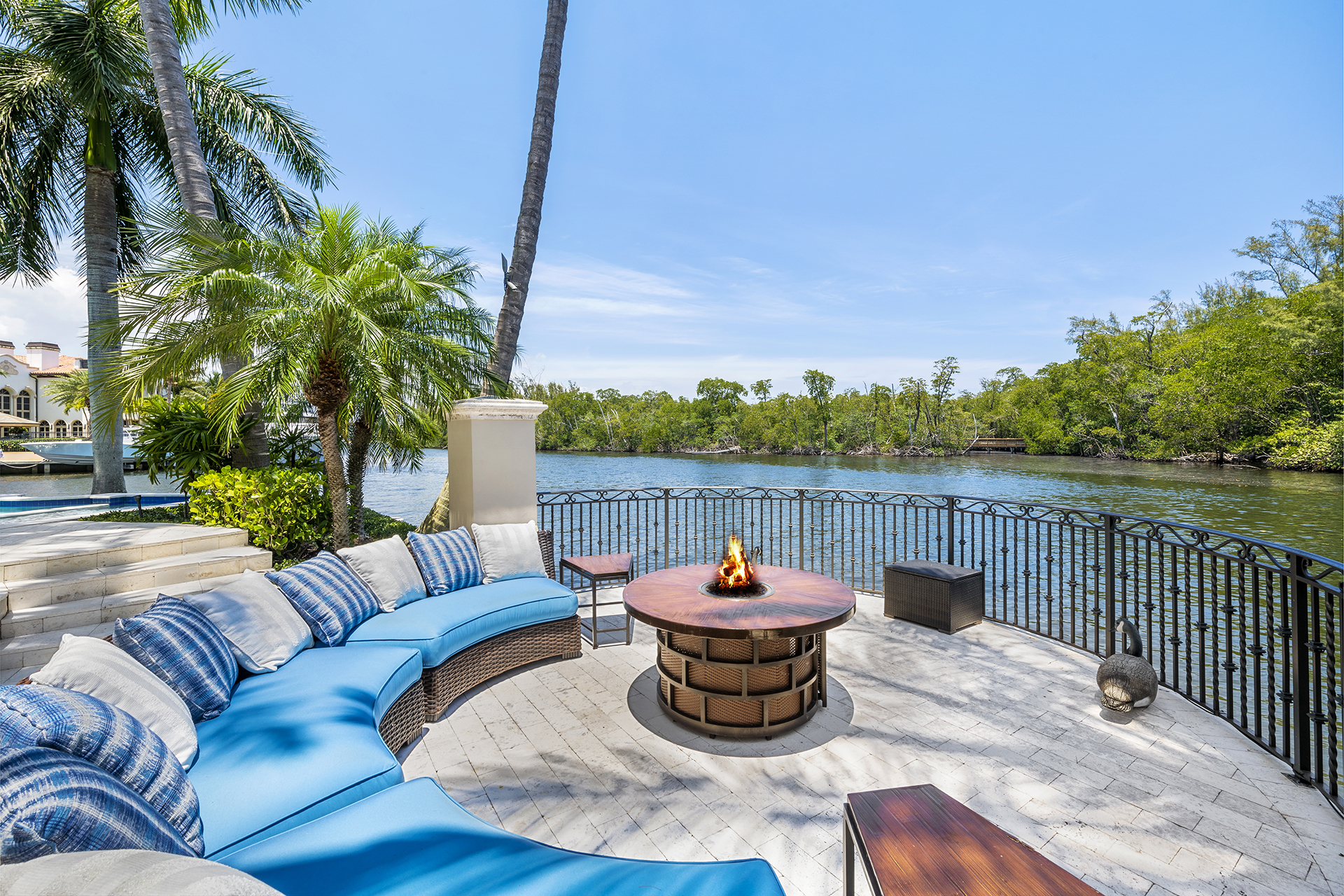 Waterfront firepit seating area beside the intercoastal